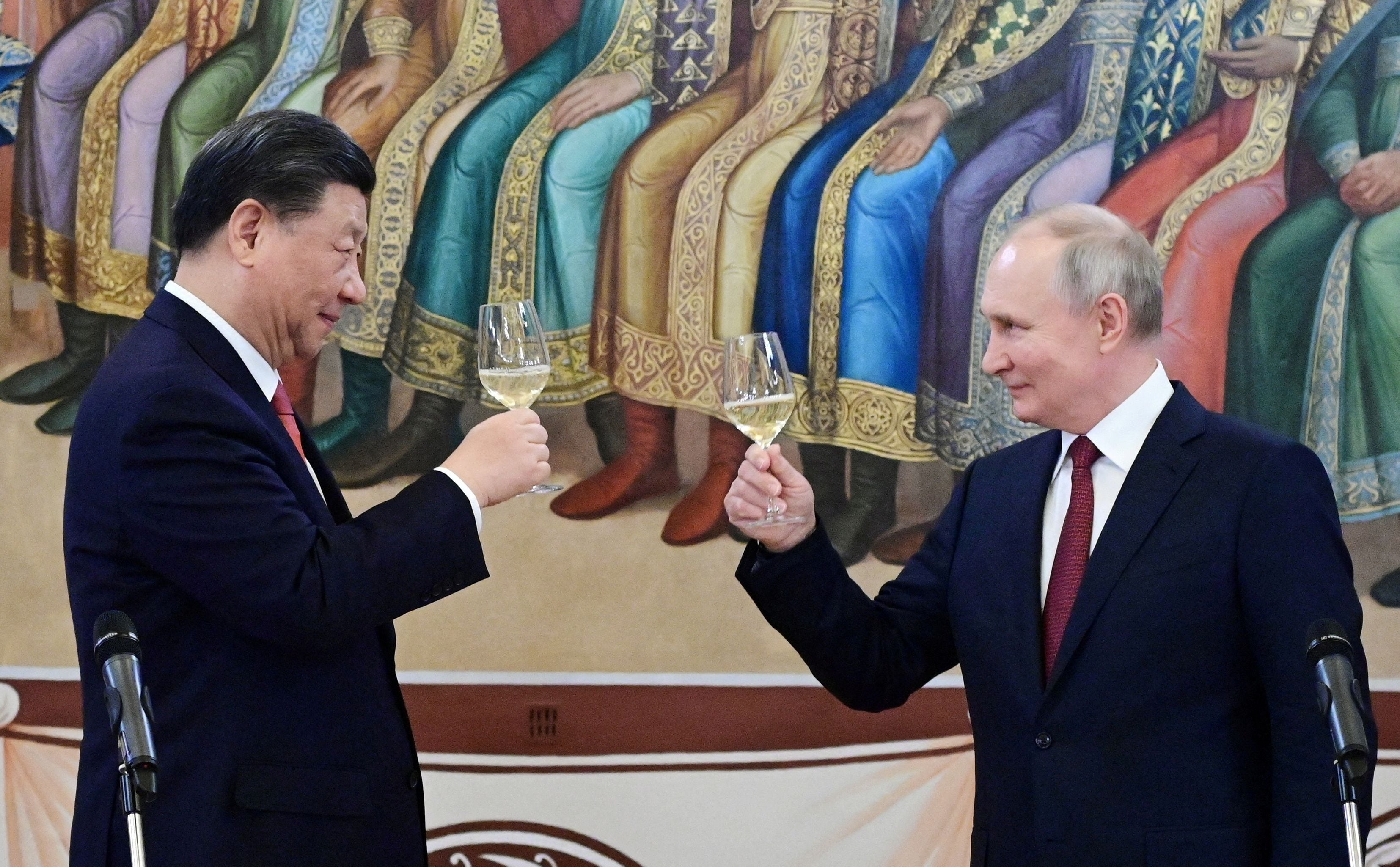 Putin, y Xi Jinping durante la recepción en el Kremlin en Moscú en marzo del año pasado. (Sputnik/Pavel Byrkin/Kremlin via REUTERS)