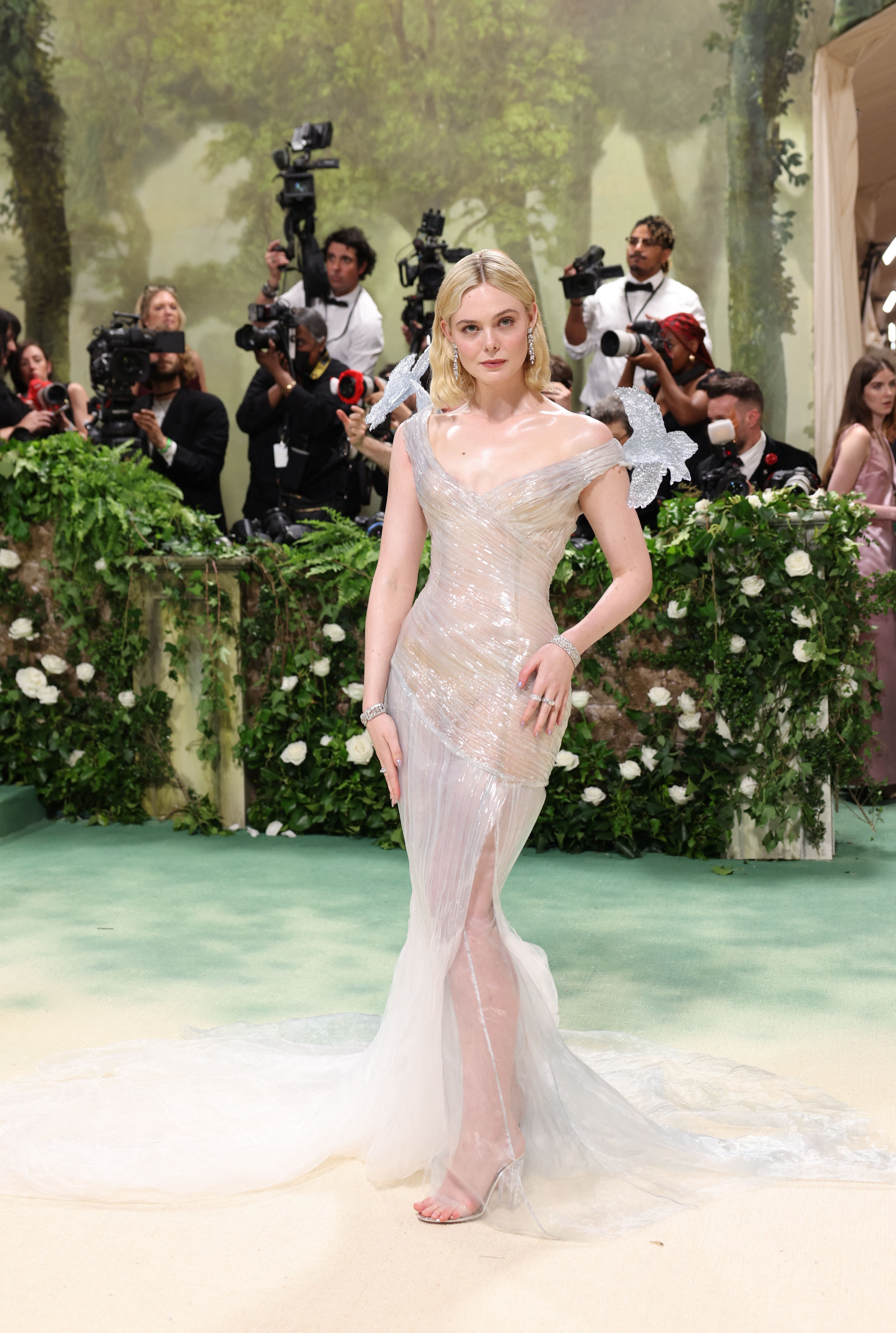 Elle Fanning poses at the Met Gala, an annual fundraising gala held for the benefit of the Metropolitan Museum of Art's Costume Institute with this year's theme 'Sleeping Beauties: Reawakening Fashion' in New York City, New York, U.S., May 6, 2024. REUTERS/Andrew Kelly